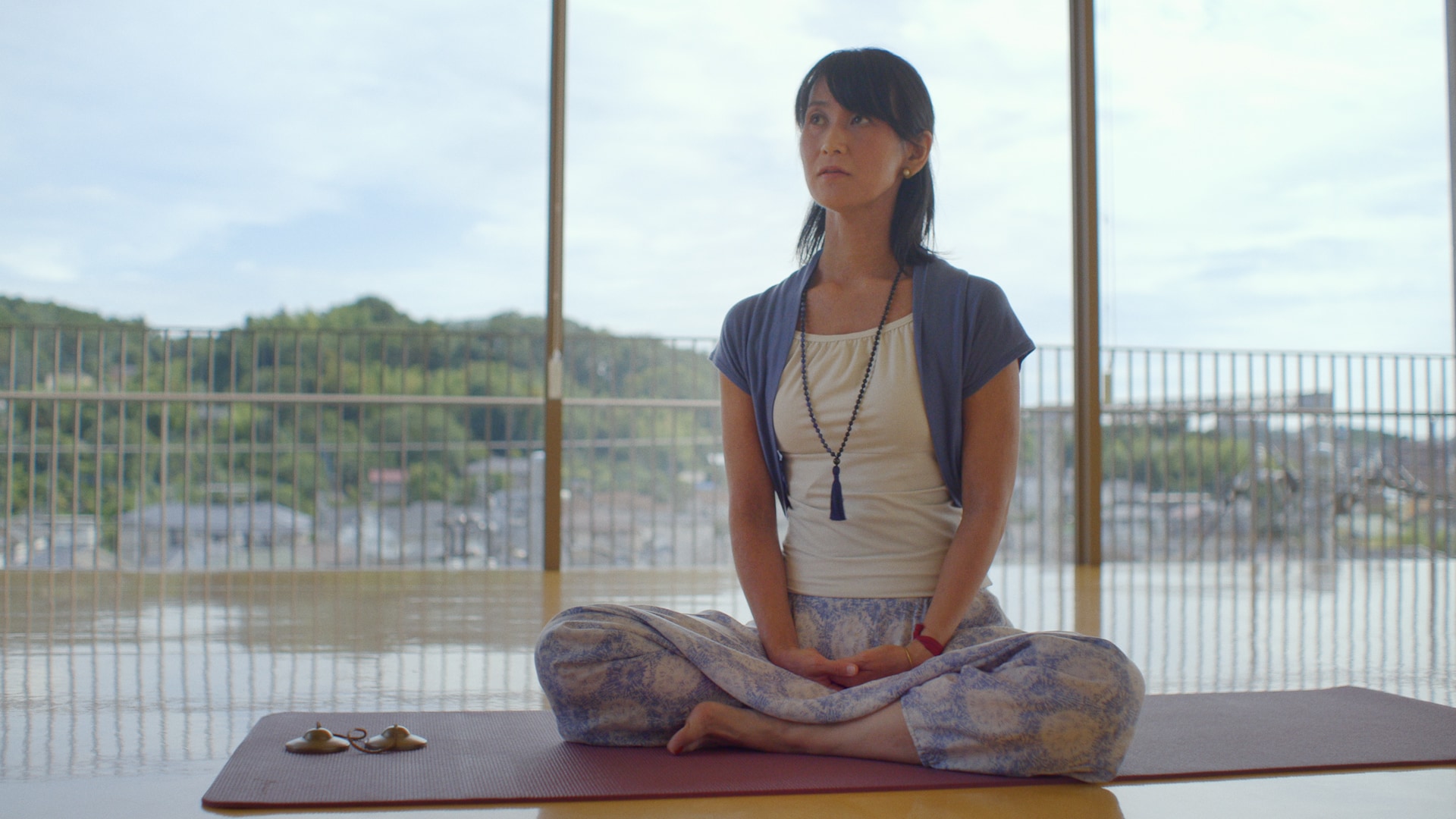 Rika in a yoga pose